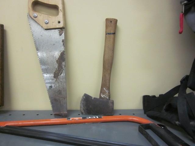 lot 101 image: Lot of (2) saws and a ax.  ...