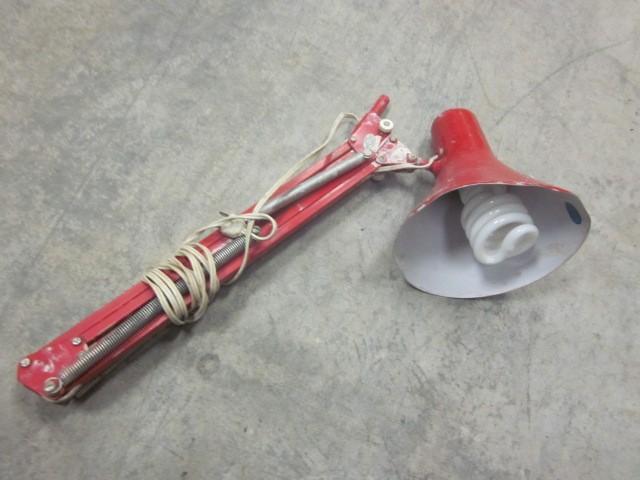lot 110 image: Red metal swing arm lamp.  ...