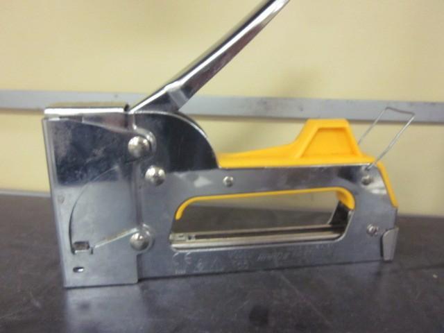 lot 116 image: Arrow staple gun....