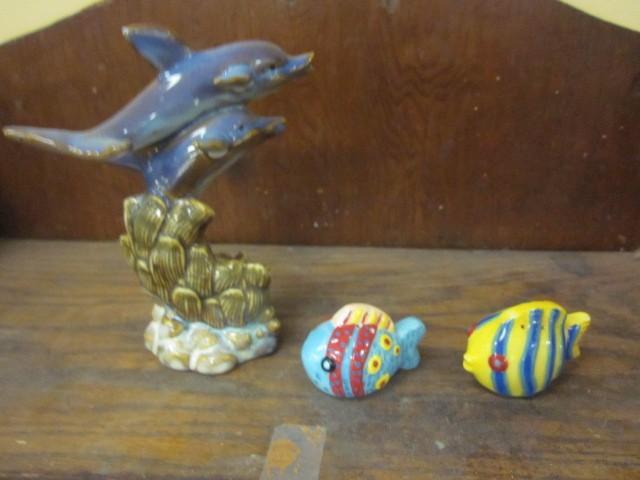 lot 124 image: Ceramic dolphin statue and ceramic ...