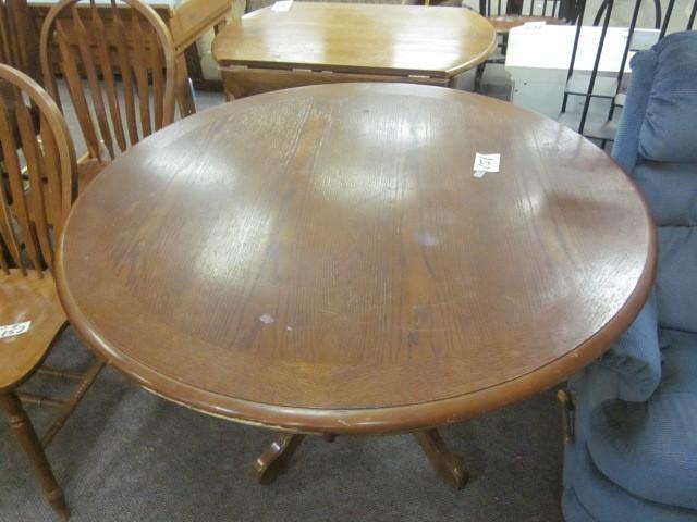 lot 151 image: Solid wood 48" pedestal table....