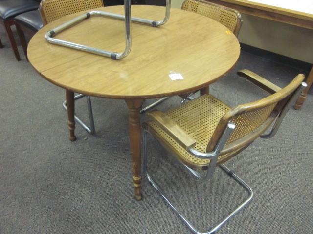 lot 179 image: 42" round solid wood table wit...