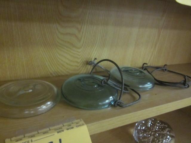 lot 31 image: (3) vintage glass Ball lids and met...