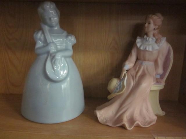 lot 34 image: Pair of decorative ceramic statues....