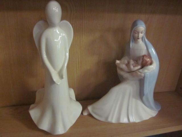 lot 39 image: Pair of porcelain statues....