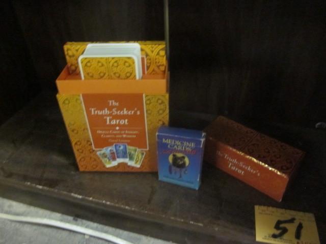 lot 51 image: The Truth Seekers Tarot cards and b...