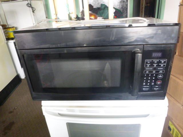lot 16 image: Over the Range Microwave   ...
