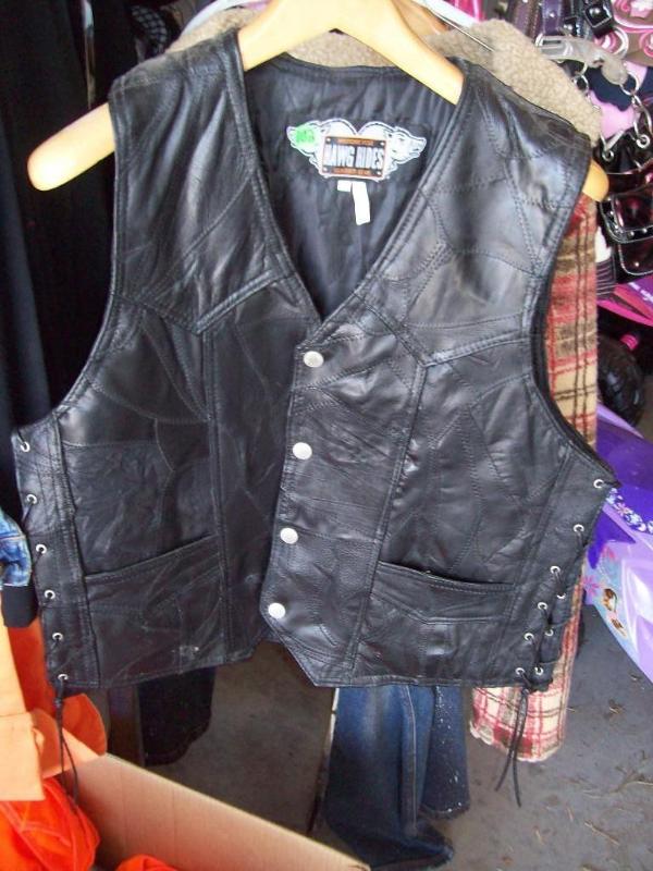 lot 102 image: Genuine Leather Hog Hides Vest