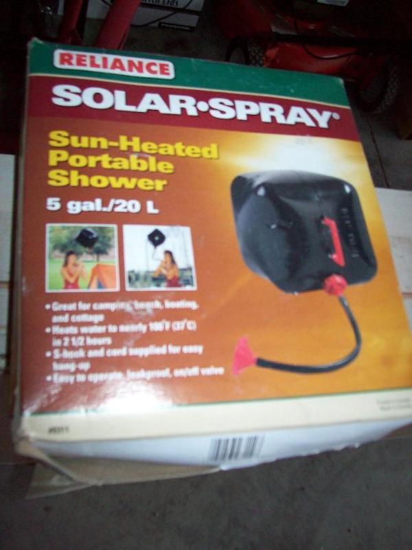lot 24 image: Sun heated portable shower...