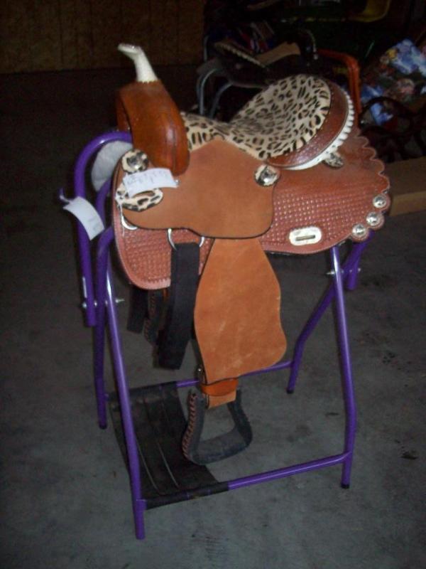 lot 3 image: Youth leopard print saddle -N...