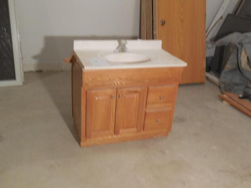 Bathroom vanity with top and faucet...
