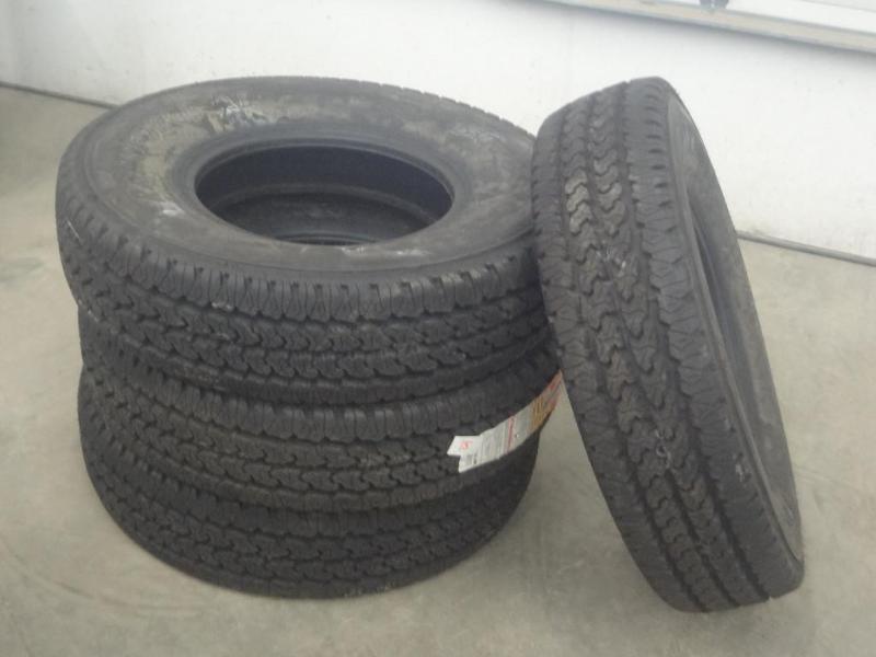 lot 15 image: (4) New Firestone Transforce AT LT2...