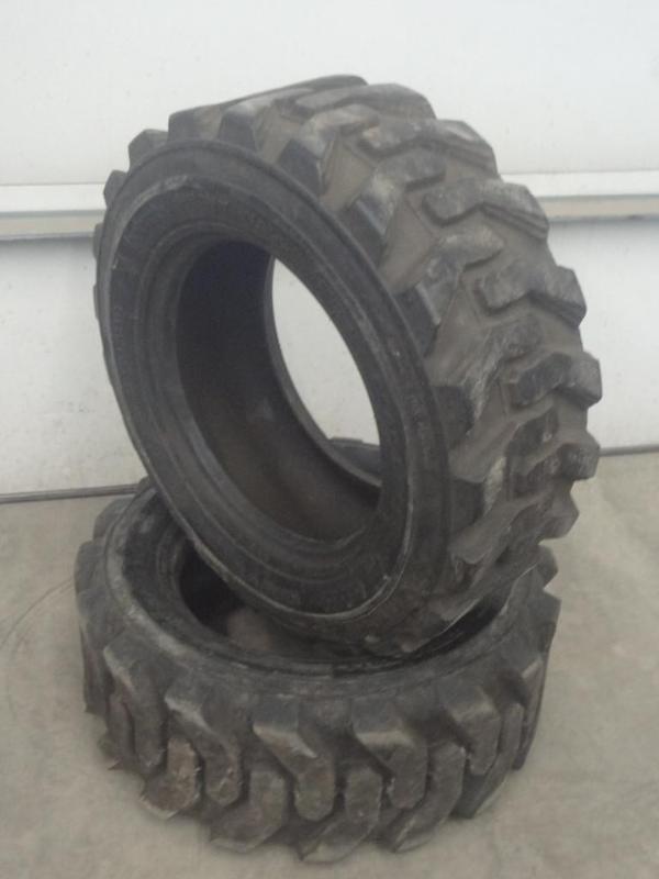 lot 19 image: (2) Bobcat 10-16.5 Skidloader Tires...