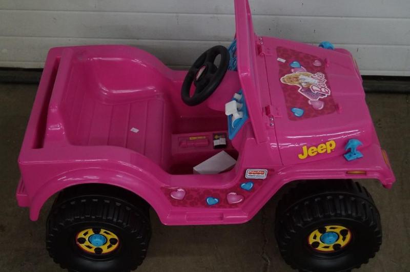 Power Wheels Barbie Jeep forward an...