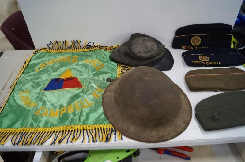 Lot of military helmet, hats, and f...