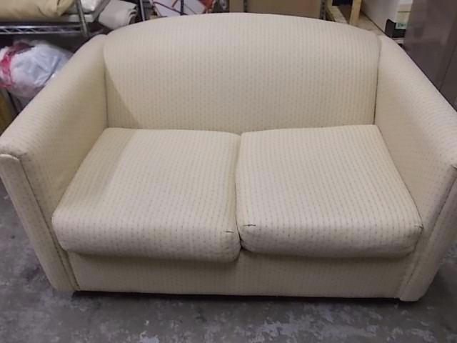 lot 37 image: Loveseat 53" Tan With Small Ac...