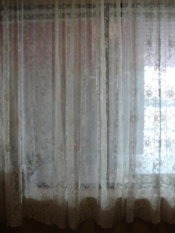 lot 1 image: Lace curtain panels - 4 panels. Ver...