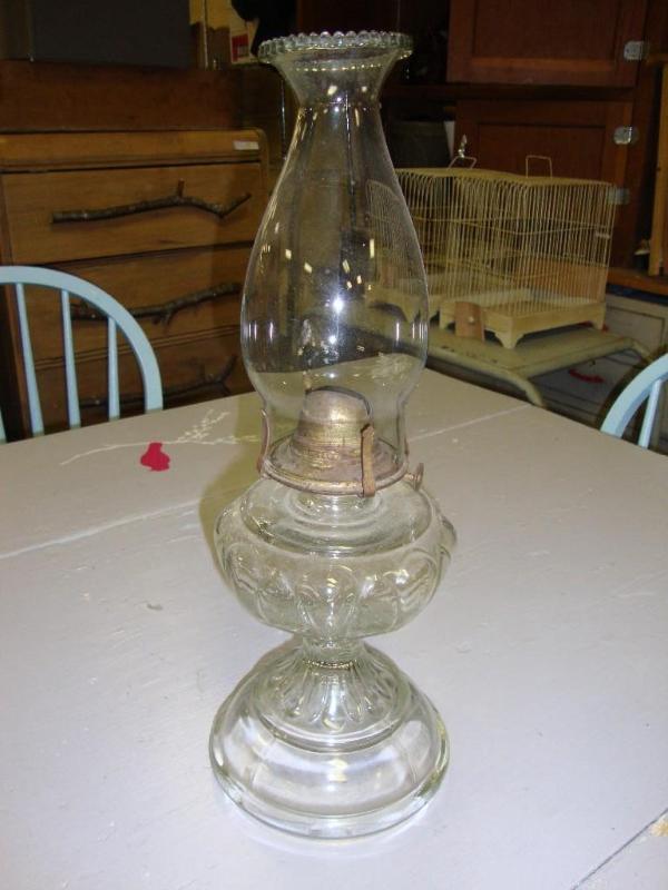 lot 28 image: Vintage kerosene lamp....