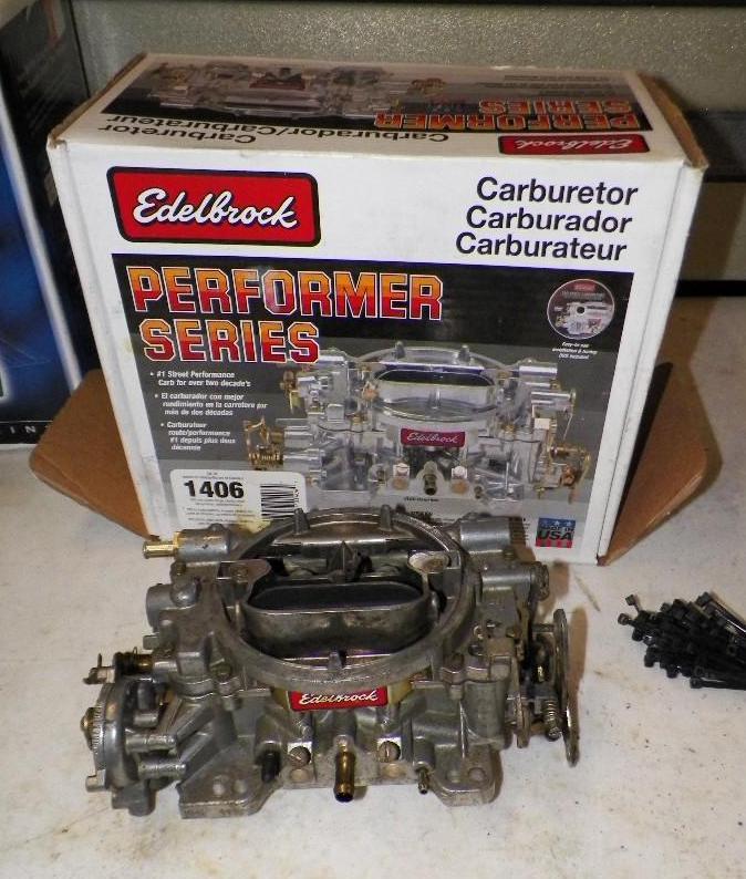 lot 214 image: Edelbrock 1406 carburater  - t...