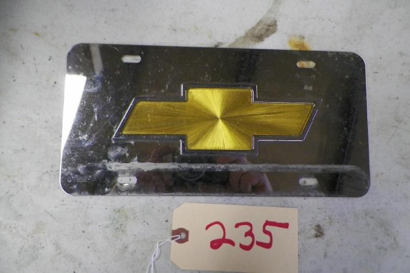 lot 235 image: Chevy license plate cover...