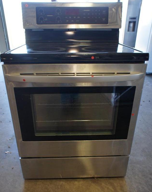 lot 8 image: LG Stove USED  Minor ware on burne...
