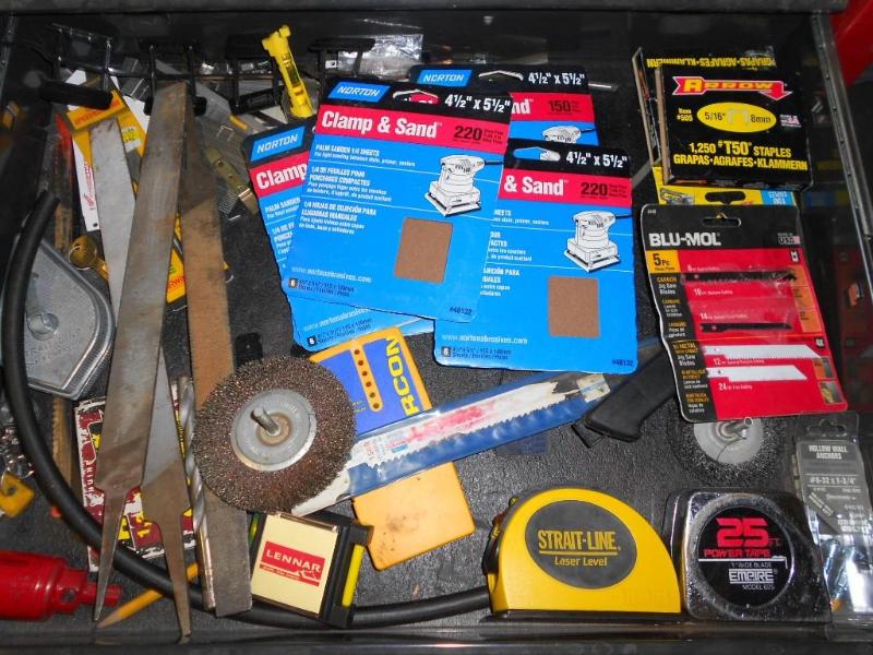 Various tools like files, laser lev...