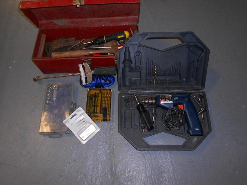 Tool Box with various tools like a ...