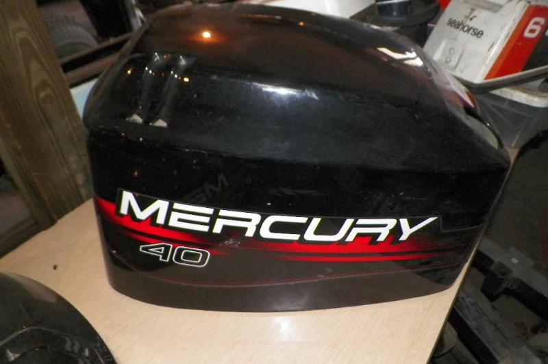 lot 121 image: Mercury 40 HP Hood- damage to back...