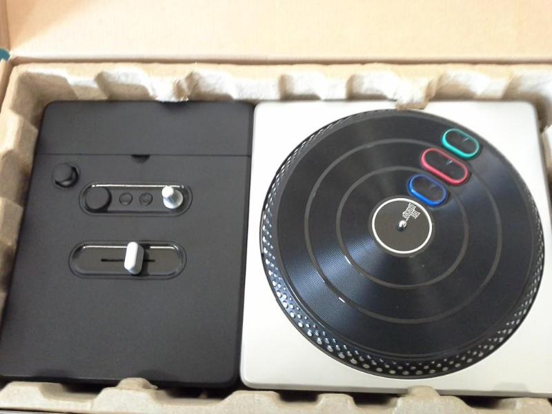 lot 23 image: DJ Hero Turntable Kit for PlayStati...