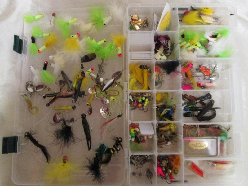 lot 53 image: Nice lot of jigs in a Cabellas cas...