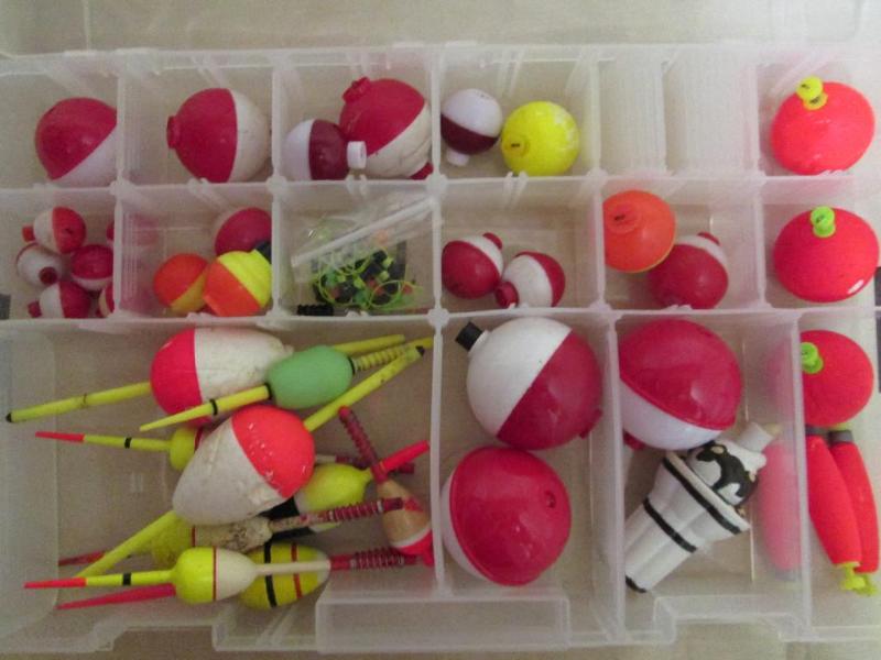 lot 58 image: Large lot of bobbers in a nice Cabe...