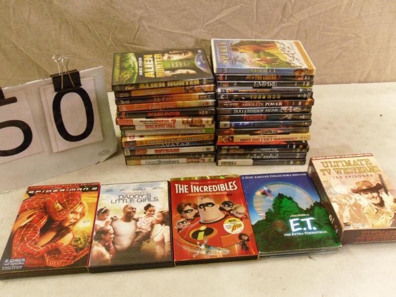 lot 50 image: Large Lot of 33 DVDS. See pics for...