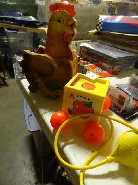 lot 136 image: 2 vintage Fisher Price pull behind ...