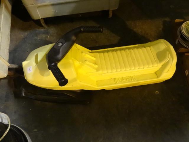 lot 149 image: Vintage Marx pull behind snowmobile...