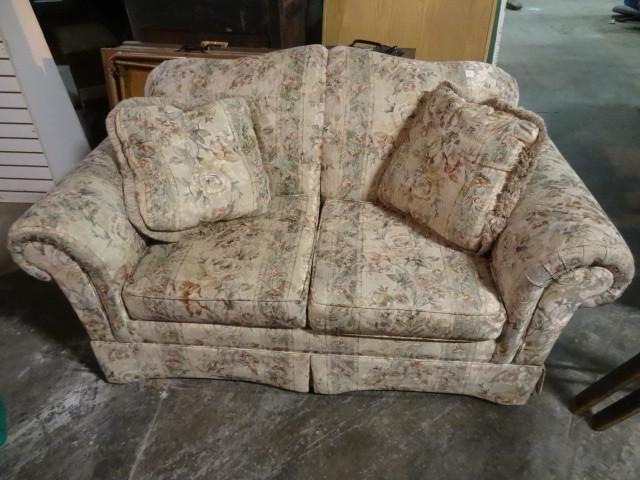 lot 19 image: Sofa love seat. Floral pattern. No ...