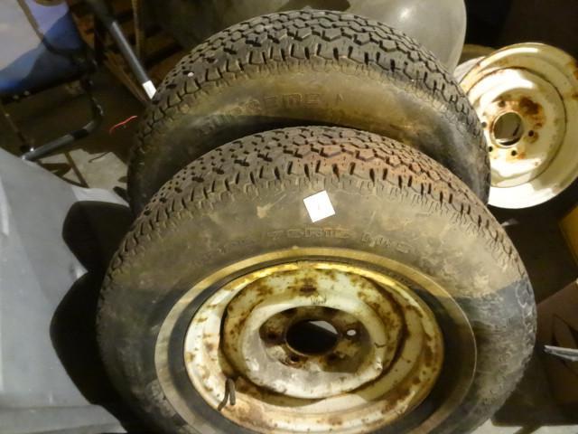 lot 2 image: 2 tires and 4 rims. P225 75R15. App...