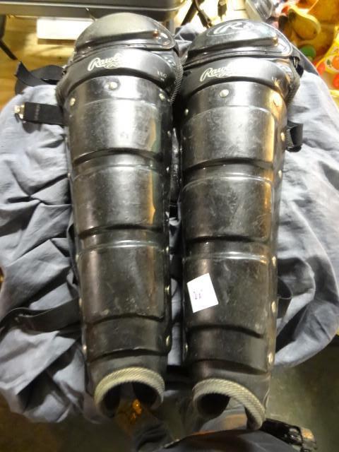 lot 207 image: Rawlings catcher knee pads...