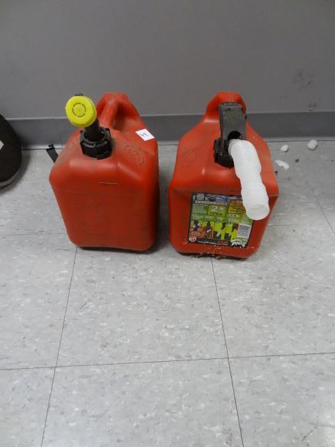 lot 49 image: 2 gal gas can. Qty 2...
