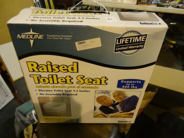 lot 91 image: Raised toilet seat...