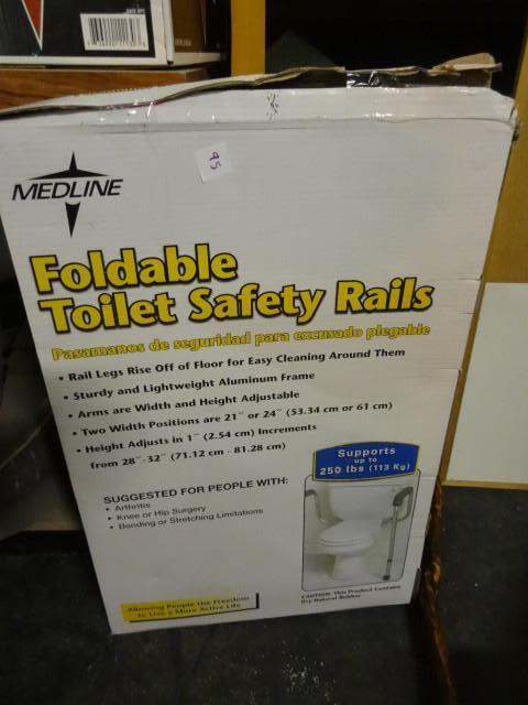 lot 95 image: Foldable toilet safety rails...