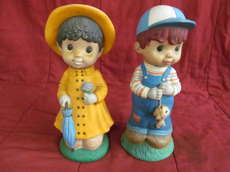 lot 17 image: Boy and Girl Statue for lawn orname...