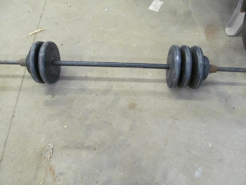 lot 235 image: Bar Bell with 60 Pounds of Weights...