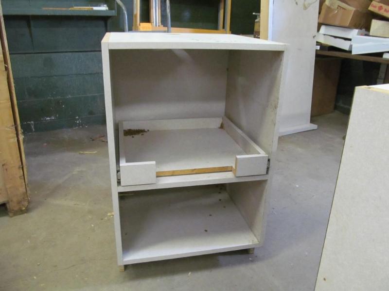 lot 44 image: Cabinet with Slide Out Tray 24"...