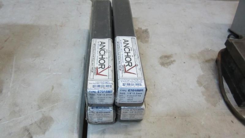 4 boxes of new welding rods...