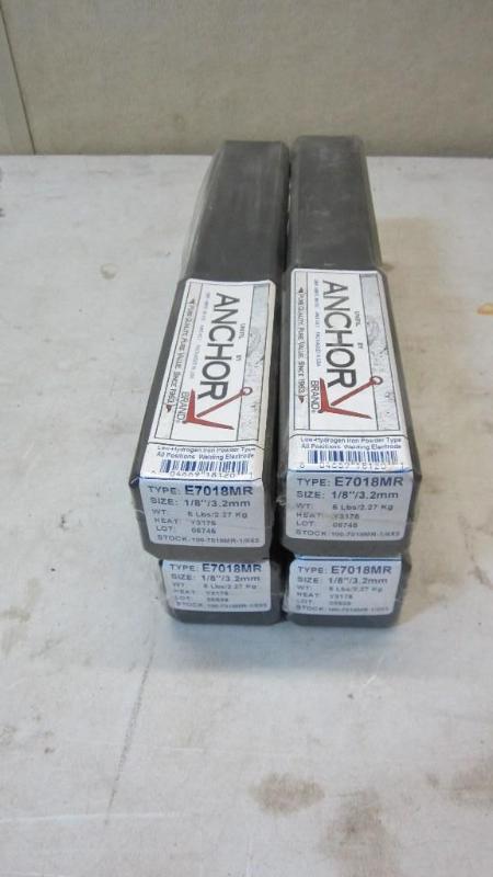 4 boxes of new welding rods...