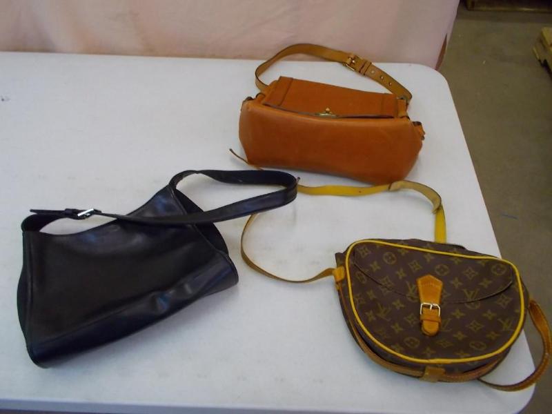 lot 11 image: 1 Marc Jacobs brown leather handbag...
