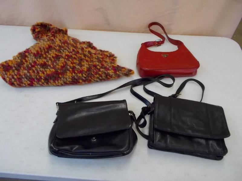lot 12 image: 1 Opale black leather shoulder bag,...