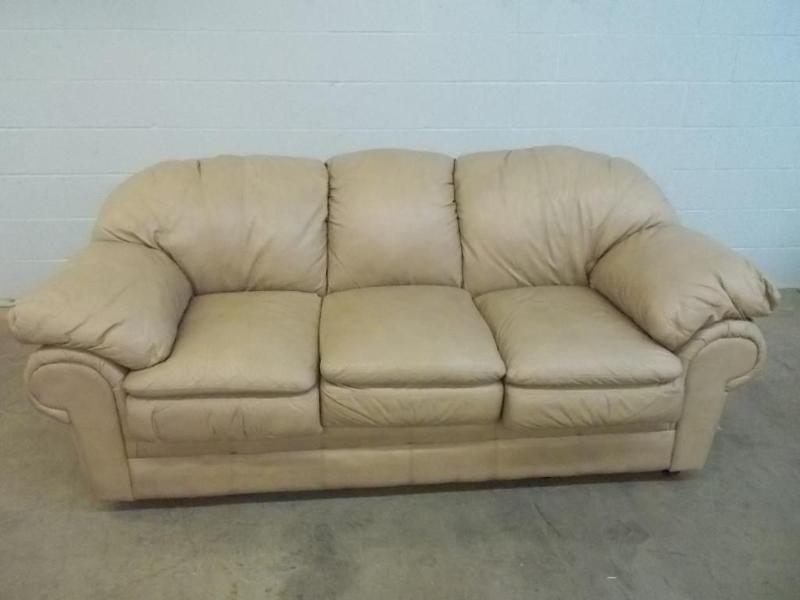 lot 5 image: Ashley leather sofa.  Matches ...
