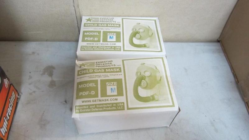 2 new childs gas masks, size M...