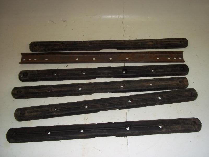 lot 115 image: Padded snowmobile track cleats...